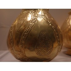Gold vessel with a cross design